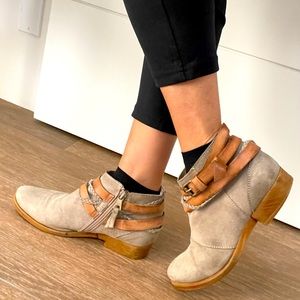 Distressed suede booties with fun tie accents. Size 38/8 from Miz Mooz
